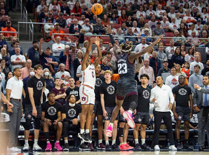 Auburn Tigers guard K.D. Johnson (0) takes a jump shot as Auburn Tigers men's basketball takes on Texas A&M Aggies at Auburn Arena in Auburn, Ala., on Saturday, Feb. 12, 2022. Auburn Tigers lead Texas A&M Aggies 33-18 at halftime.